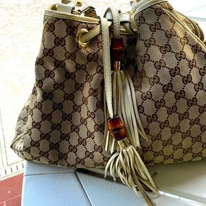 Authentic Gucci needs restoration.